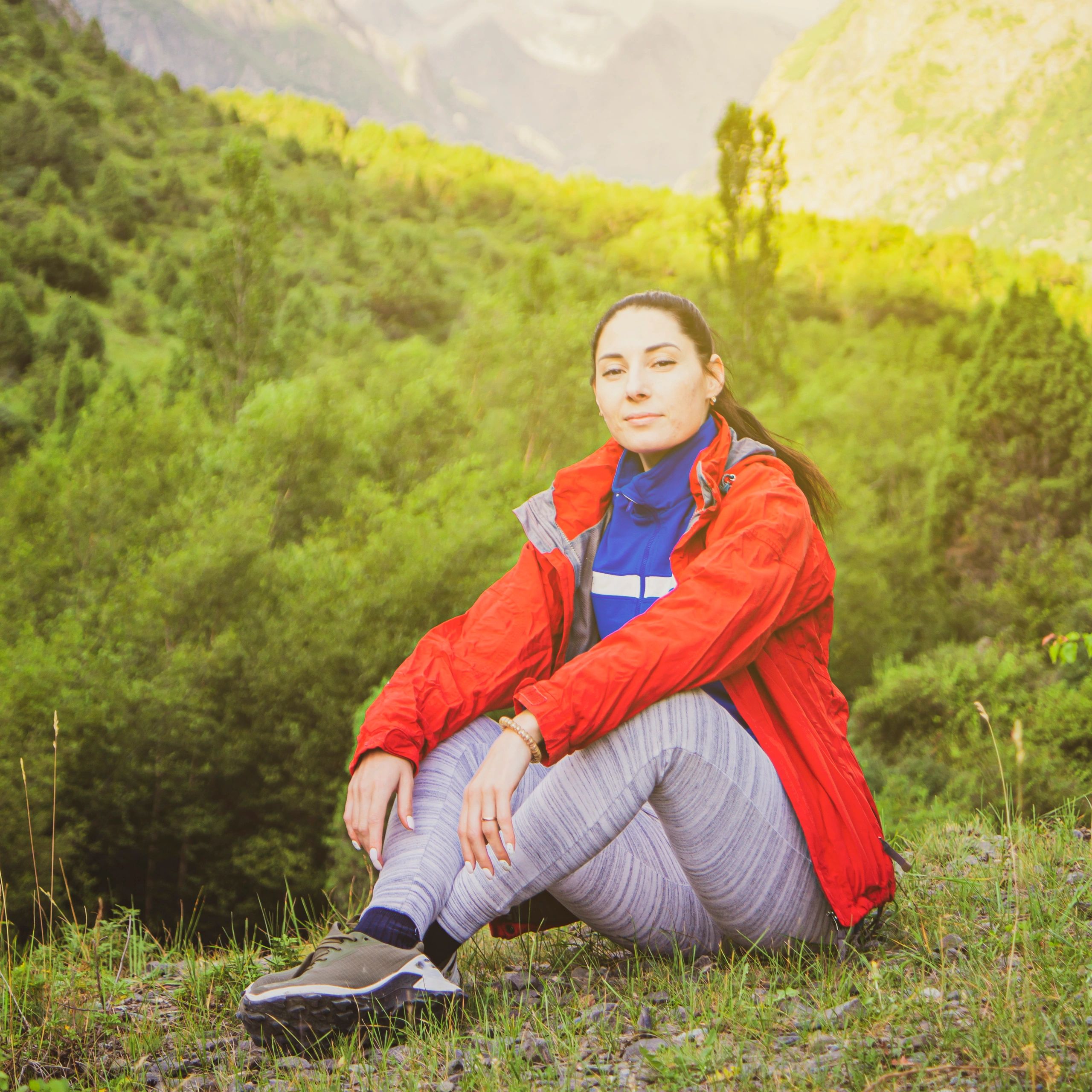 Portrait of a traveler enjoying mountain scenery