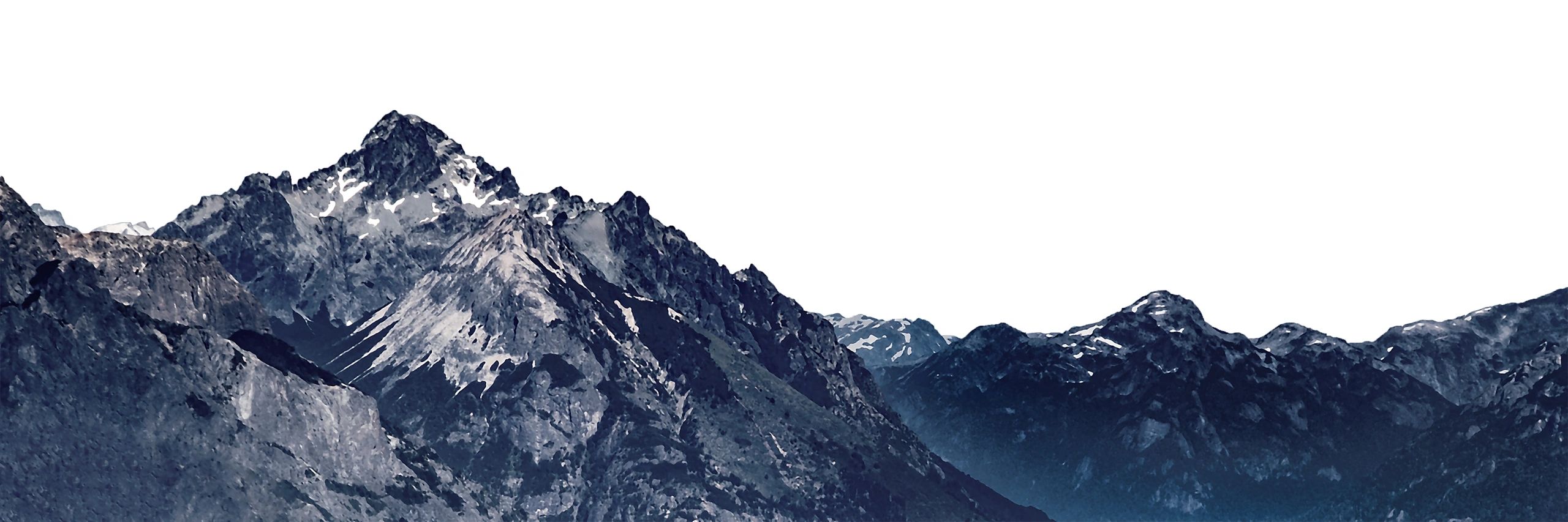 Majestic mountain landscape with rugged peaks and snow-capped summits, illustrating the terrain and conditions for climbers and hikers.