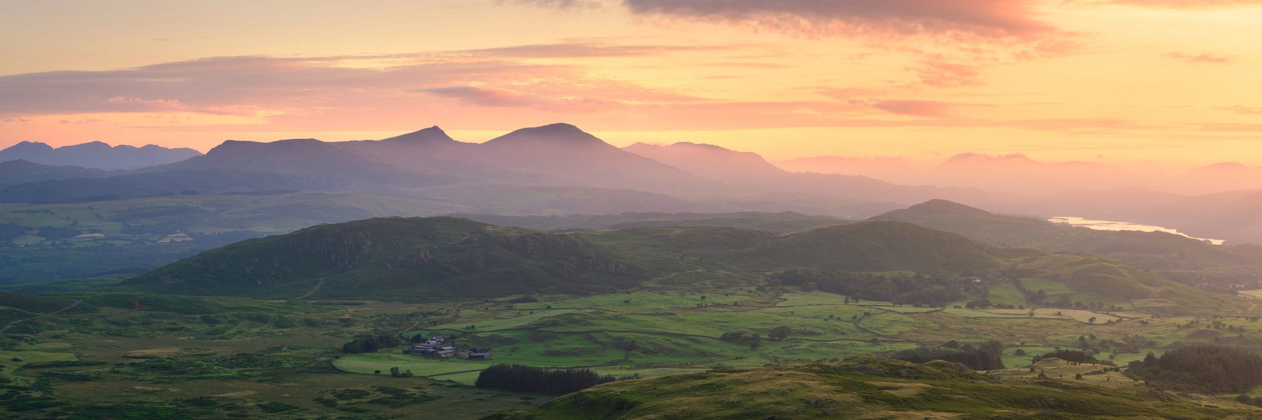 Mountain range at sunrise panorama