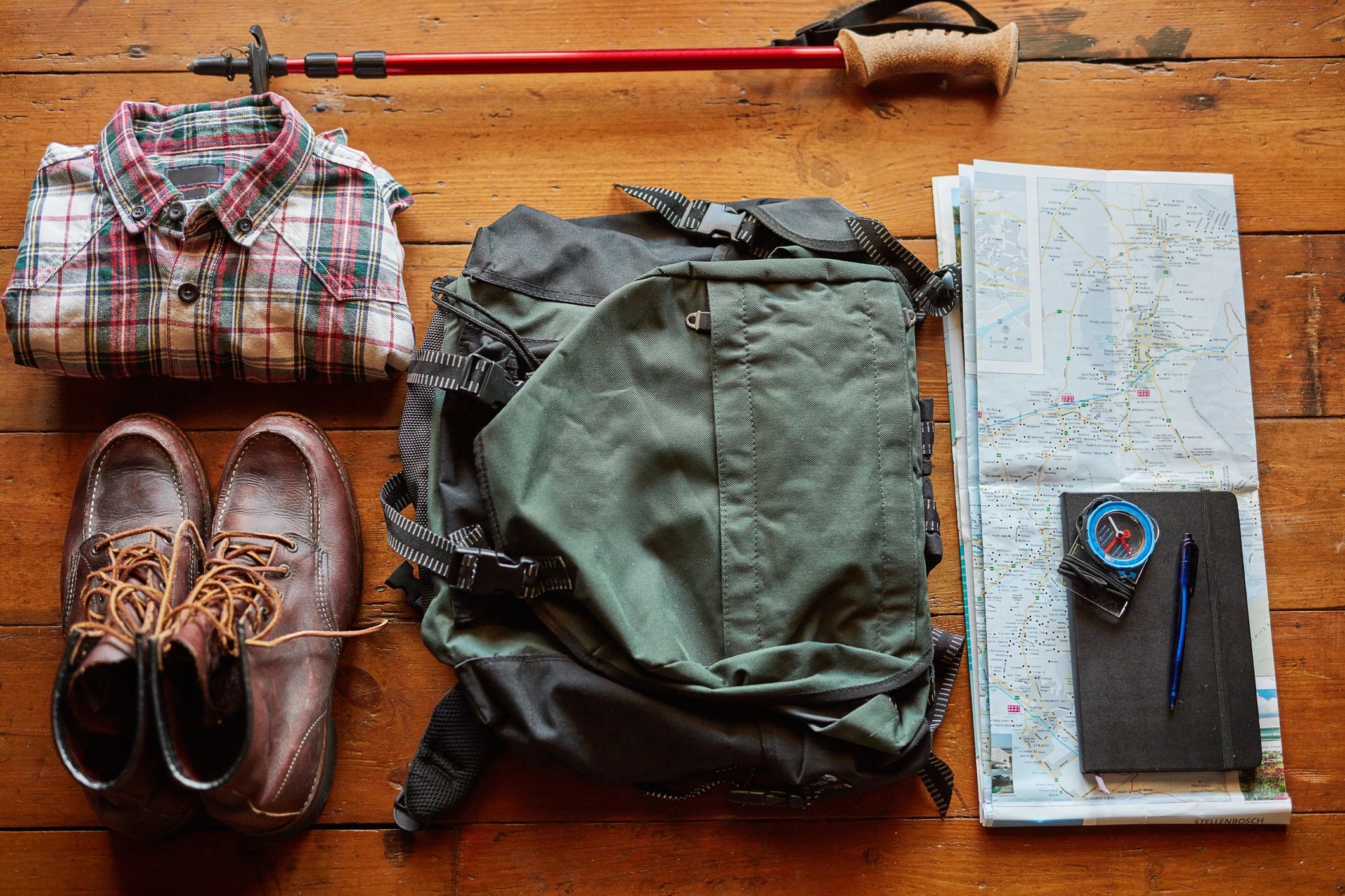 Mountaineering and hiking gear laid out for a trip