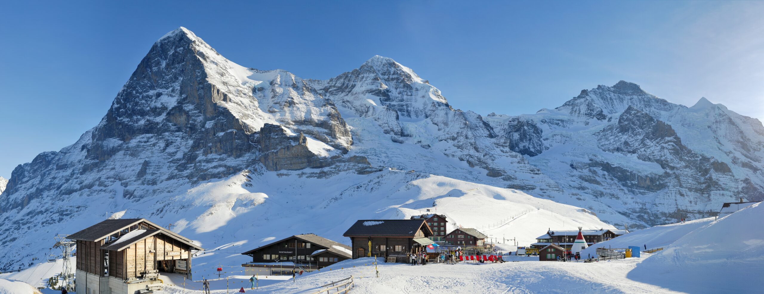 The Eiger at 3967 meters in the Bernese Alps Switzerland viewed from Kleine Scheidegg railway station with the dramatic North Face known as the Mordwand visible — the legendary Alps technical peak first climbed in 1858 by Charles Barrington