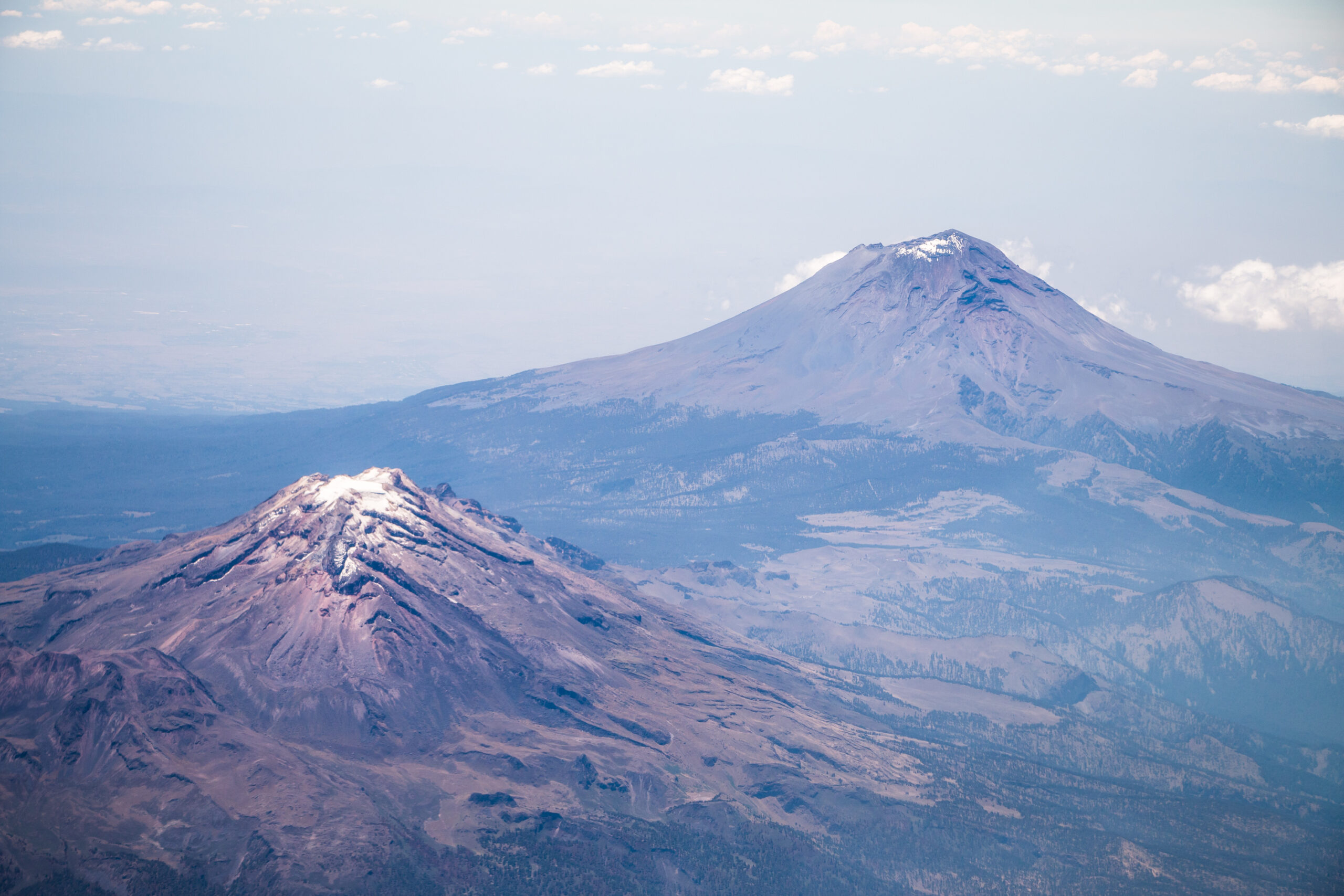 Iztaccíhuatl — Mexico's third-highest peak at 5,230m, the Sleeping Woman of Aztec legend, with the snow-covered summit ridge visible across the Trans-Mexican Volcanic Belt
