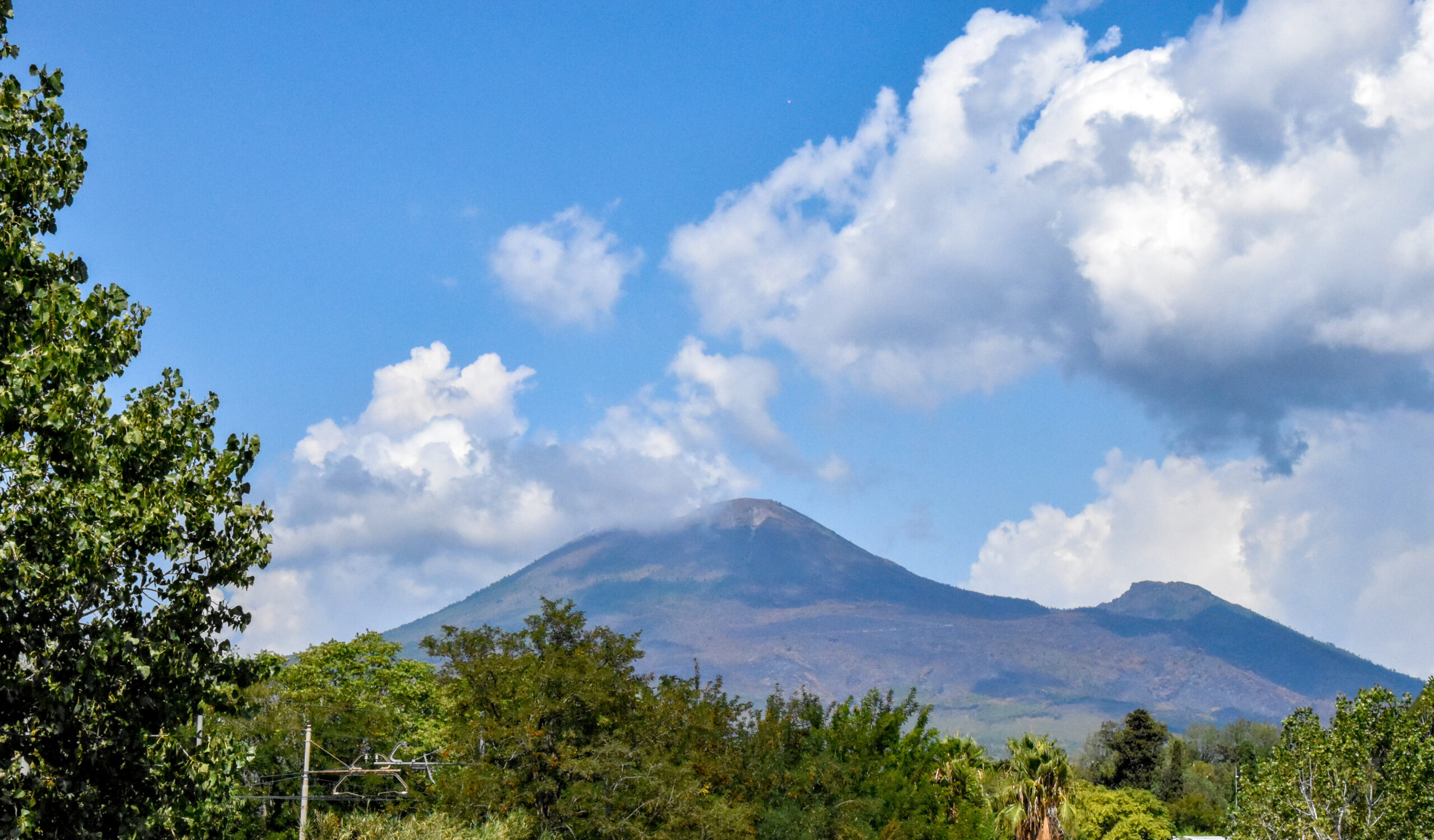 Mount Vesuvius rising above the Bay of Naples — Italy's most famous active volcano and the site of the catastrophic AD 79 eruption that destroyed Pompeii and Herculaneum
