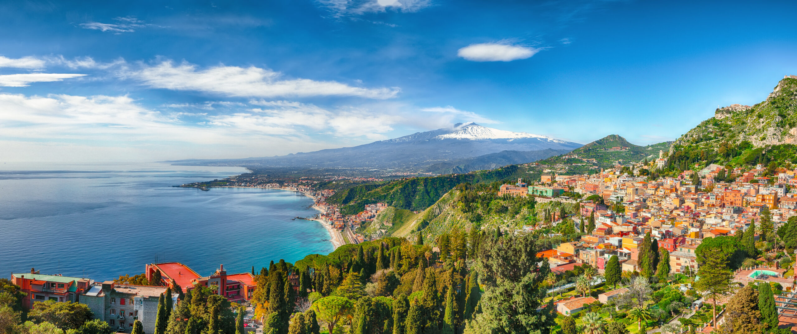 Mount Etna seen from Taormina across the Ionian Sea &mdash; Europe's highest and most active volcano in Sicily, Italy