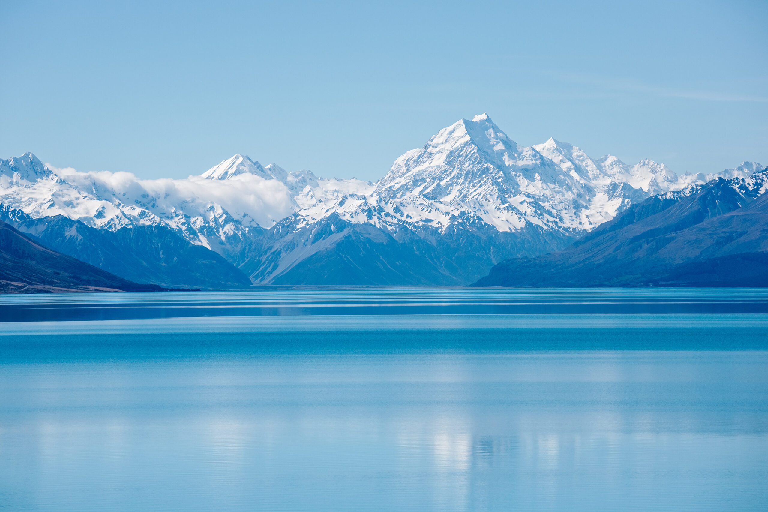 Aoraki/Mount Cook reflected in Lake Pukaki &mdash; New Zealand's highest peak rising 3,724m above the Southern Alps, sacred Ngāi Tahu mountain and centerpiece of Aoraki/Mount Cook National Park