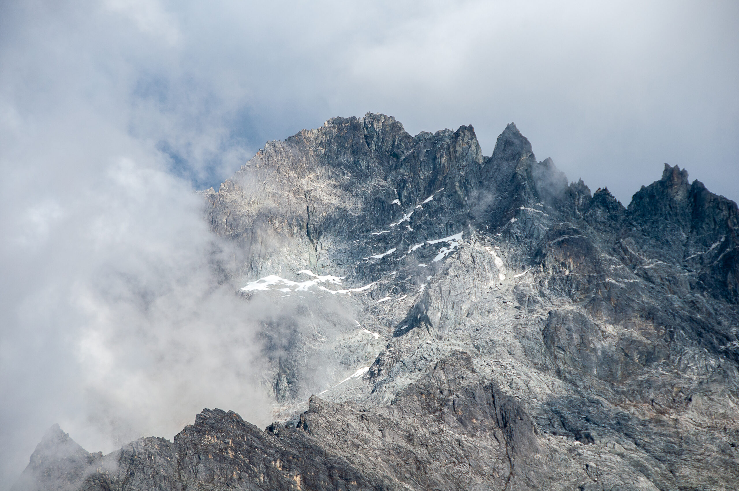 Pico Bolivar at 4978 meters the highest peak in Venezuela showing the dramatic rocky summit and rapidly retreating glaciers in the Sierra Nevada de Merida with the surrounding Venezuelan Andes peaks visible during 2026 climbing season