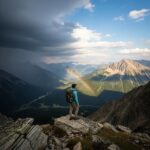 Mountain landscape illustrating diverse weather conditions for climbers
