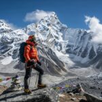 Mountain landscape with a hiker preparing for high-altitude adventure, emphasizing altitude sickness awareness