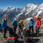 Stunning view of the Andes mountains with adventurers preparing for an expedition