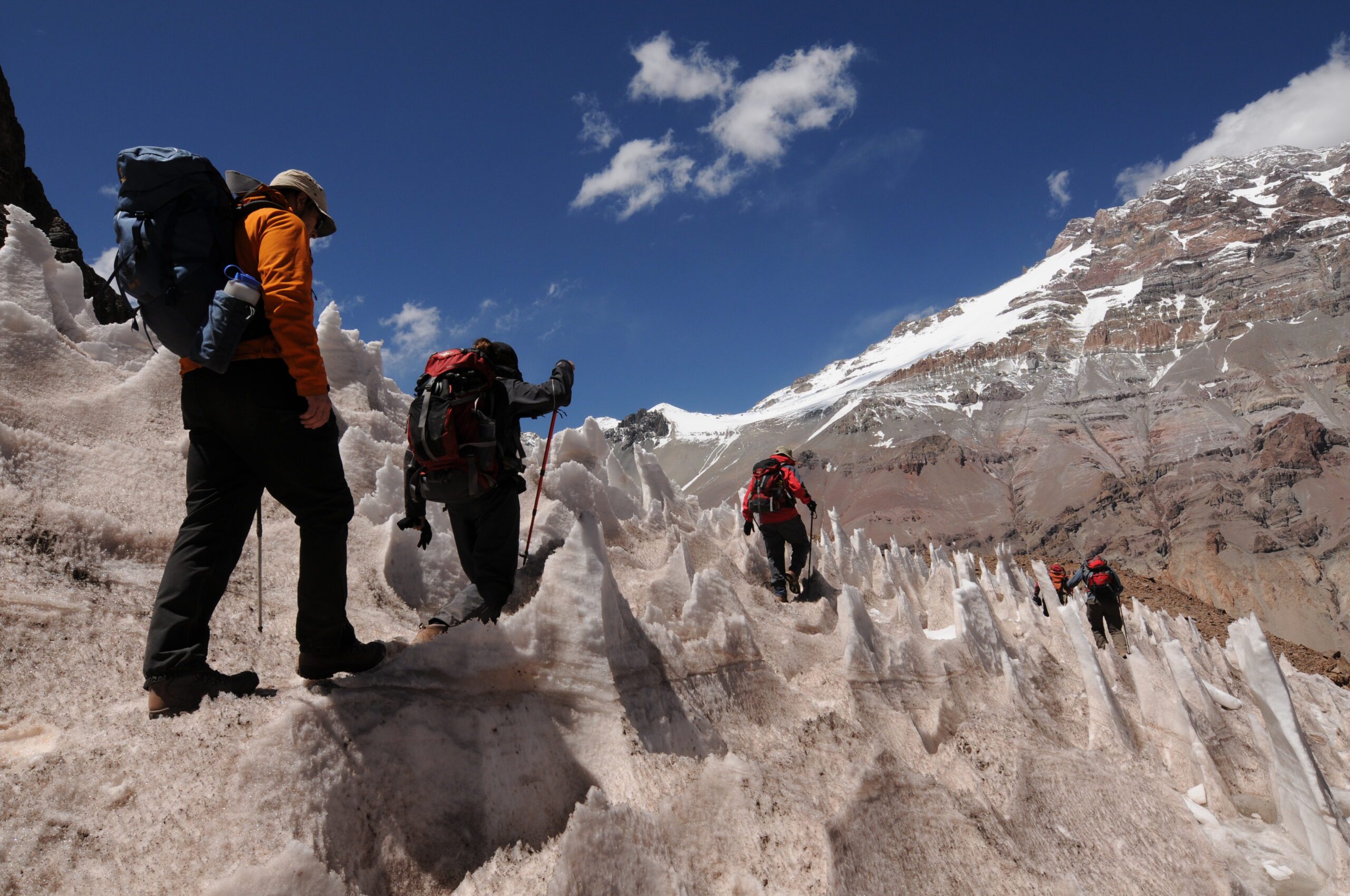 Mountaineer high on a snow slope at altitude, illustrating the acclimatization Aconcagua requires