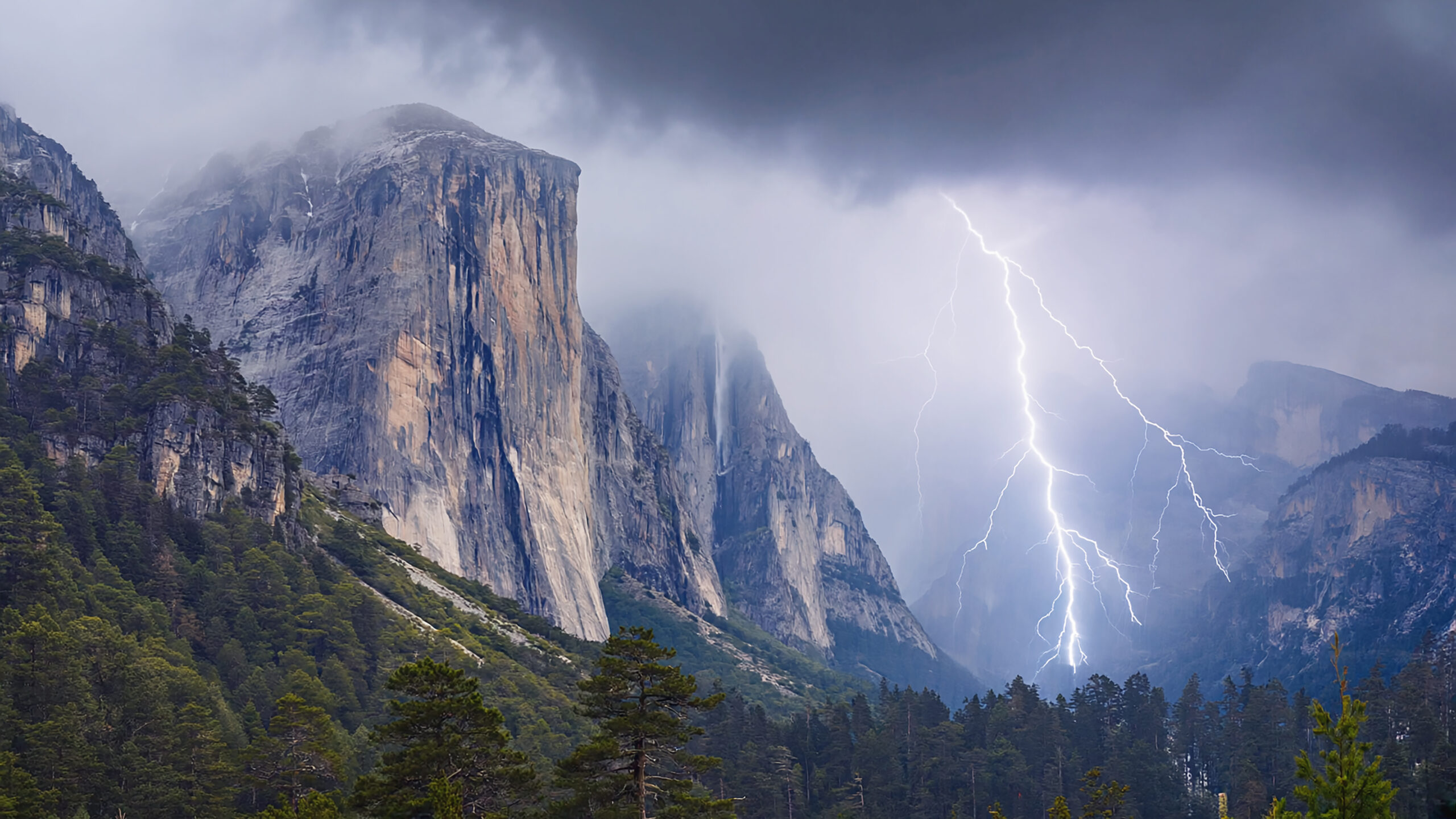 Lightning storm over a dramatic mountain landscape