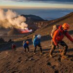Climbers ascending a volcano, showcasing the adventure and beauty of volcano climbing
