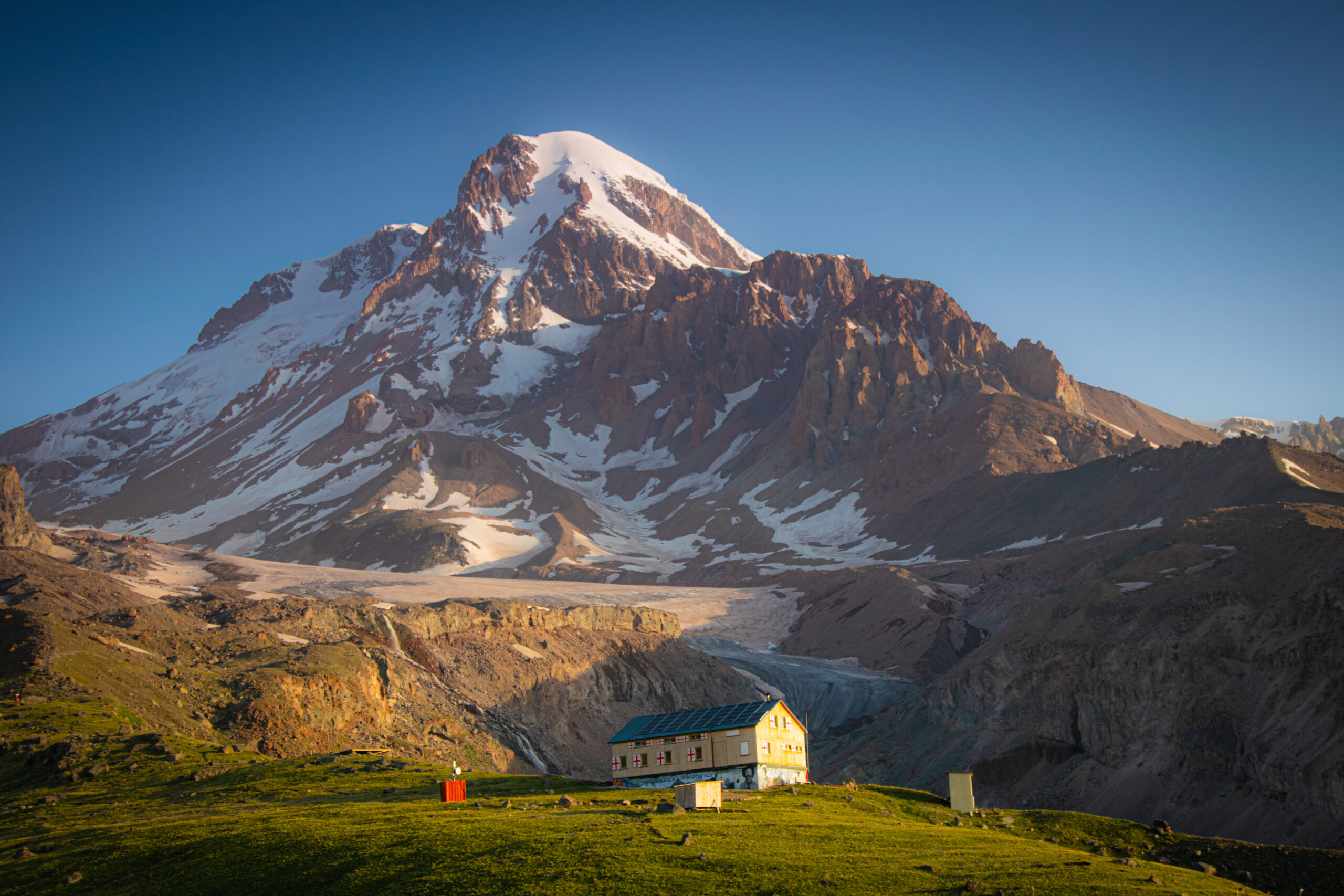 Bethlemi mountain hut below Mount Kazbek and the Gergeti Glacier in Georgia