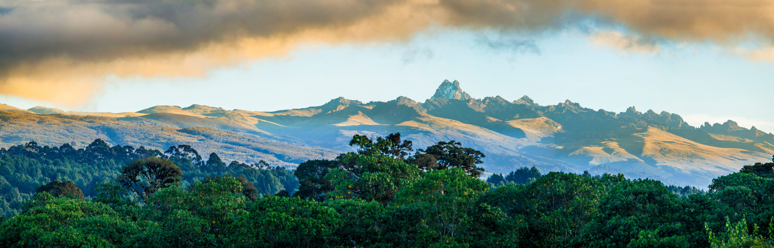 Mount Kenya peak at sunrise, Africa’s second-highest mountain, showcasing climbing routes and landscapes.
