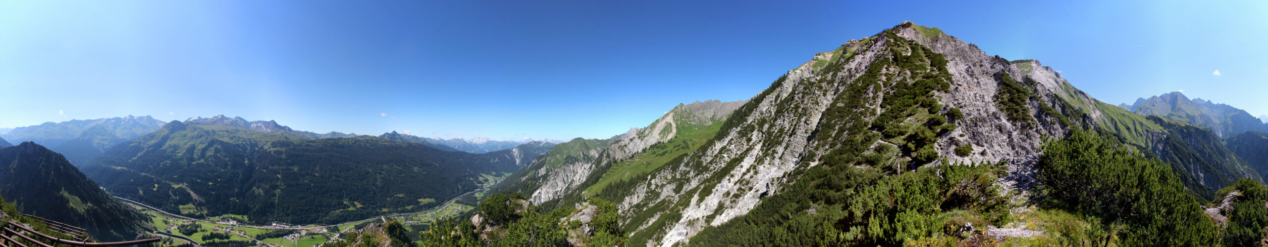 A climber on steep exposed mountain terrain where a single decision carries high consequences