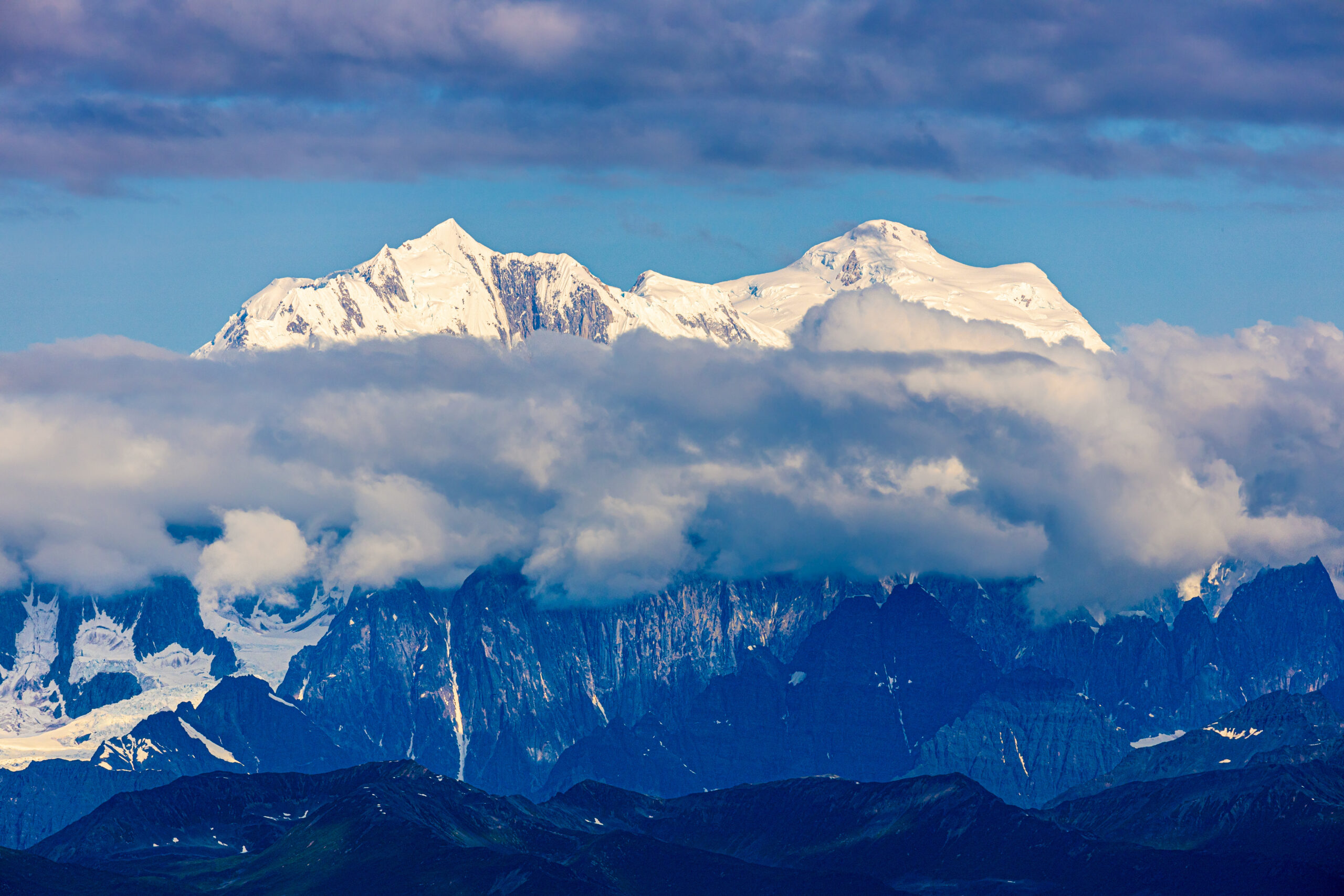 Mount Hunter, Begguya, rising steep and corniced above the Kahiltna Glacier in the Alaska Range